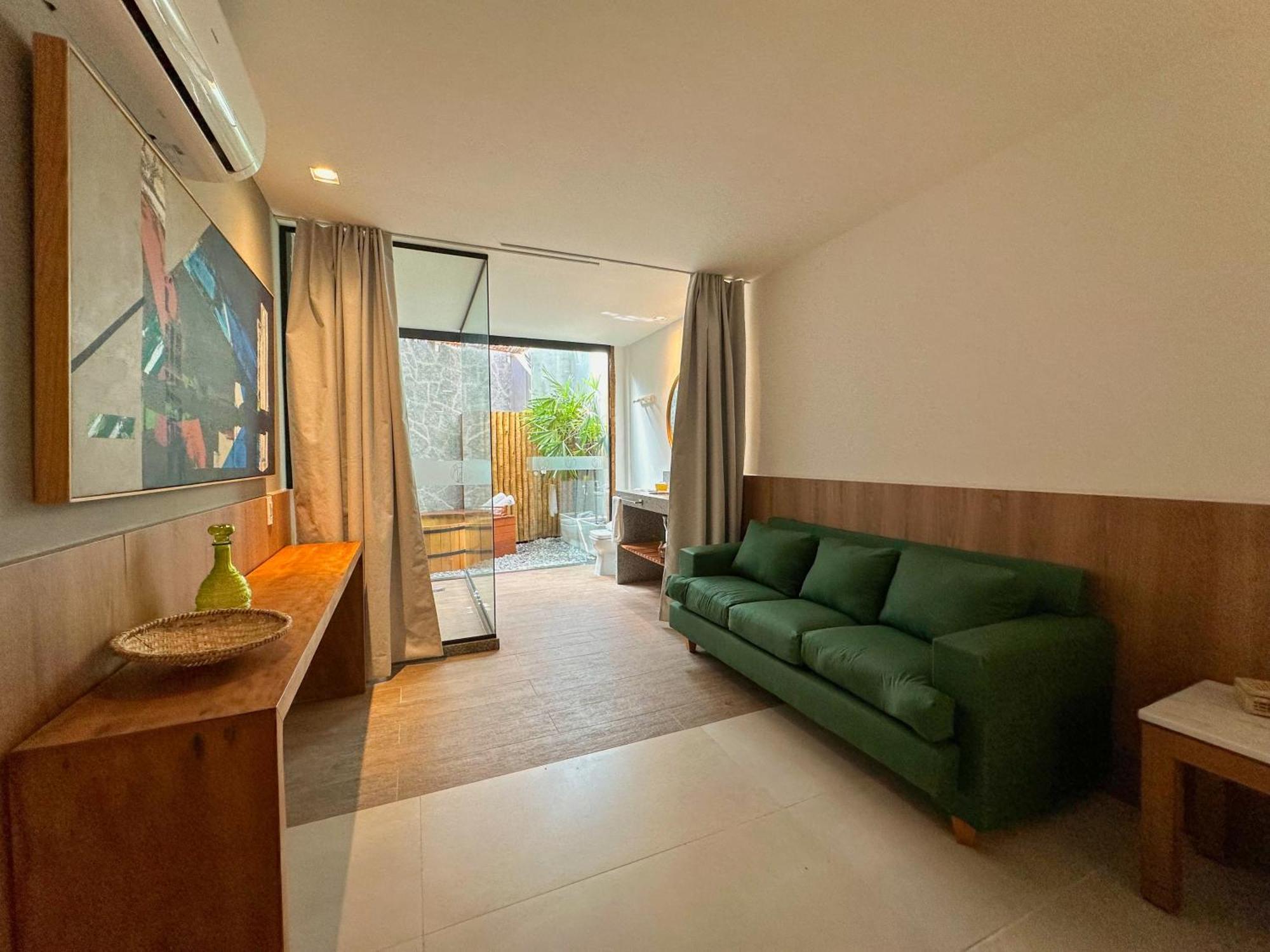 Passagem Concept Hotel E Spa Cabo Frio Exterior photo A living room in a micro apartment in Beijing, China